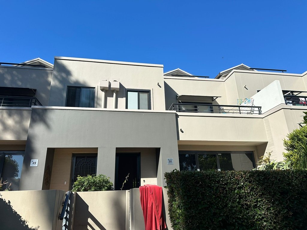 Exterior repaint finished on rendered strata townhouses in Sydney